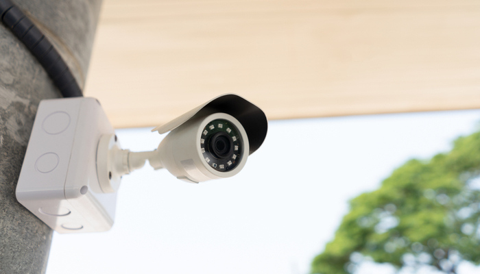 White outdoor CCTV watching camera for public safety and security